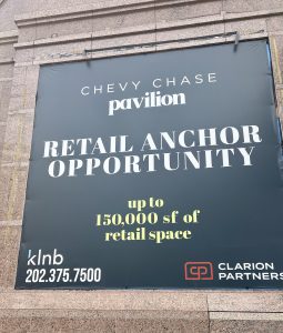 Photo of a banner sign advertising "Retail Anchor Opportunity" at the Chevy Chase Pavilion.