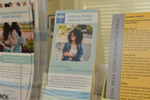 A Potomac Family Planning Center pamphlet picturing a woman reading "Your choice, a private matter."