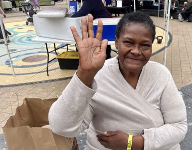 Elaine Coleman, an unhoused DC resident, visits the farmers market.