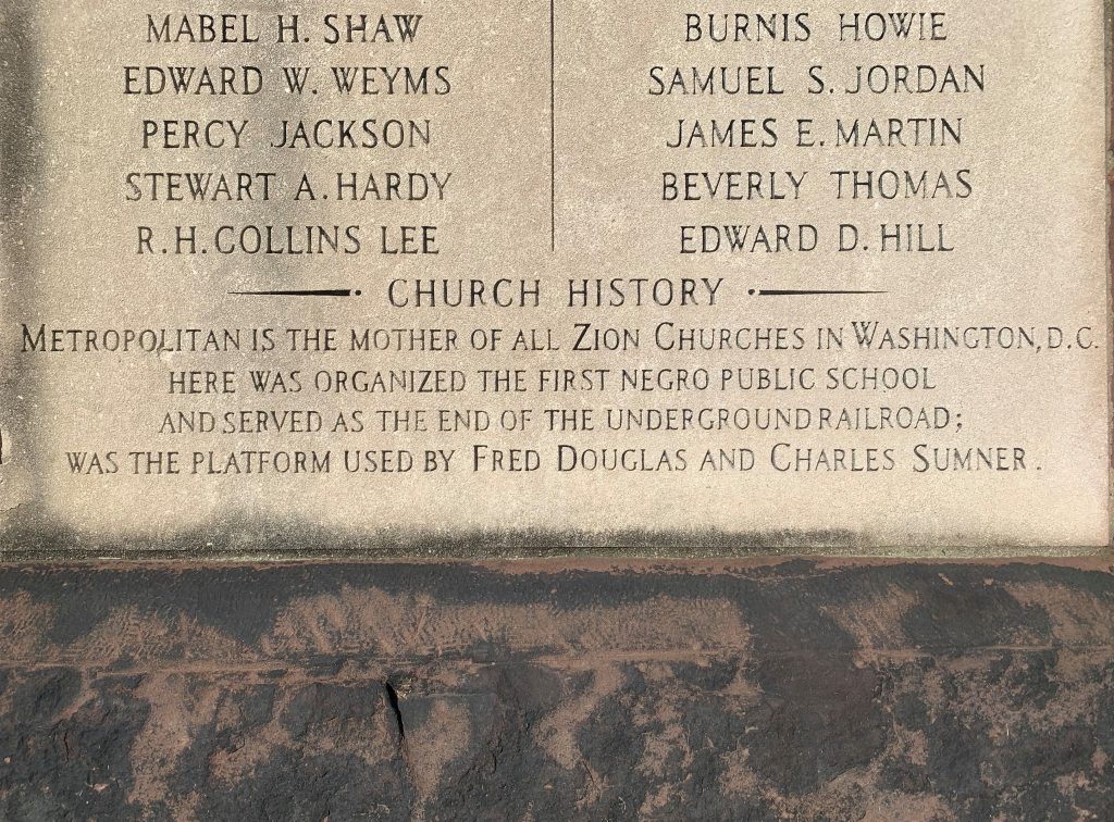 a close up of the plaque on the front of Metropolitan Wesley AME Zion Church