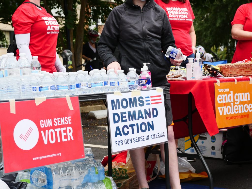 Members of MOMS Demand Action were at the bike rally supporting black students. They also provided water and other refreshments at the rally (Photo taken by Alex Lucas).