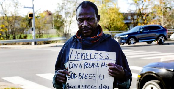 Moe Jackson stands at the intersection of Arlington Mills Road and Shirlington Road in the Arlington Nauck Community. According to Metropolitan Washington Council of Government’s 2020 survey, Black residents represent 10% of the total Arlington population but 38% of the county’s homeless population. (Alex Lucas / The Wash)