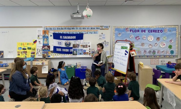 Emily Gasoi reads to students at Marie Reed Bilingual Elementary School (Courtesy Emily Gasoi)