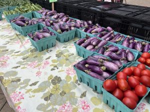 Tomatoes and eggplants at the farmers market