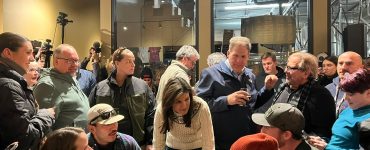 Nikki Haley speaks with potential voters in a local New Hampshire brewery.