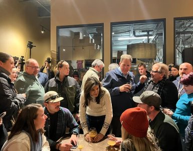 Nikki Haley speaks with potential voters in a local New Hampshire brewery.