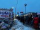 Line of hundreds of people outside of a Trump rally.