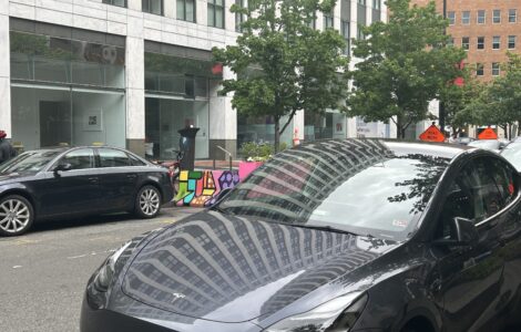 Tesla electric vehicle parked in downtown D.C.