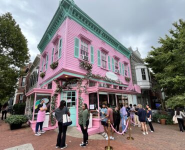 Exterior of Call Your Mother Georgetown with people waiting in line outside