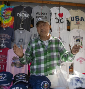 A man stands in a vendor truck.