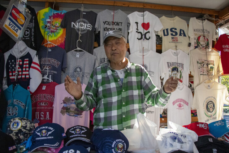 A man stands in a vendor truck.