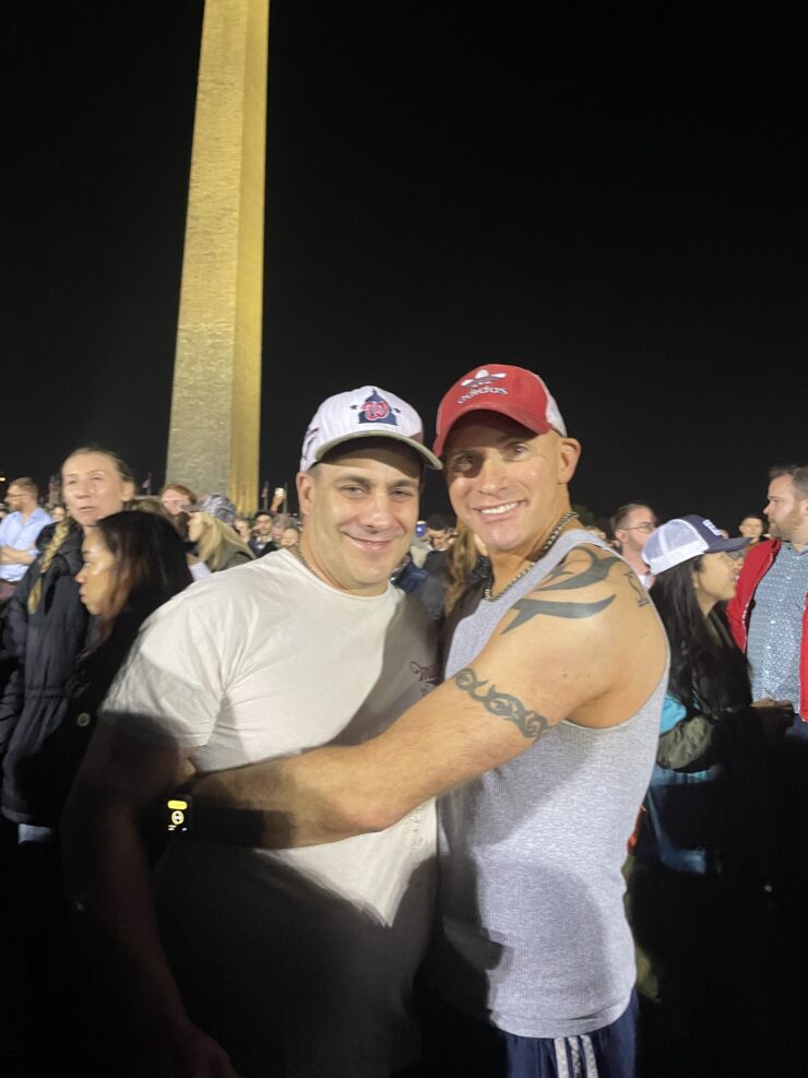 Men in front of Washington Monument