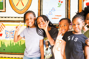 Jelleff Boys and Girls Club kids smiling at the camera