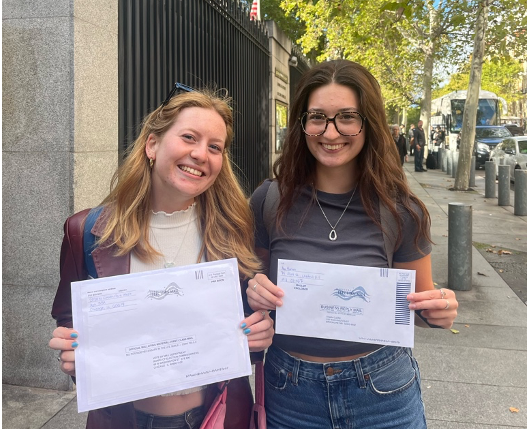 American University students Eve Bryner and Ana Martino encouraged peers to vote in Madrid, Spain. (Photo courtesy of Lane Thimmesch)