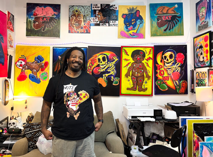 Trei Ramsey stands in front of his art in his studio space at 52 O St. Studios in Washington, D.C. on Sat. Oct. 26, 2024. Photo by Josie Ansbacher