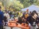 Festivalgoers gathered around tables set up in the park, painting pumpkins and engaging in conversations. Dupont Circle’s Fall Festival, Saturday, Oct. 26. Photo by Hajar Aboueddahab