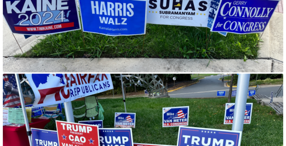 Election signs in front of voting site.