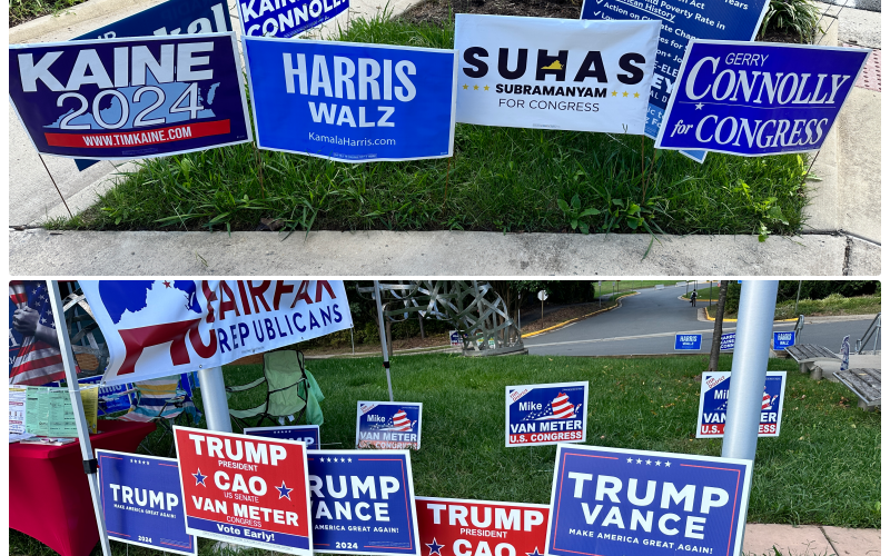 Election signs in front of voting site.