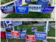 Election signs in front of voting site.