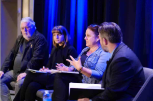 Jen Jacobsen speaking at a symposium about AI and public interest. (Photo Credit: Jen Jacobsen)