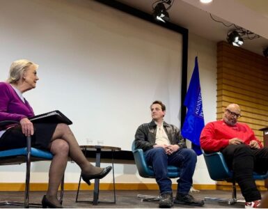 Police officers speaking to American University students