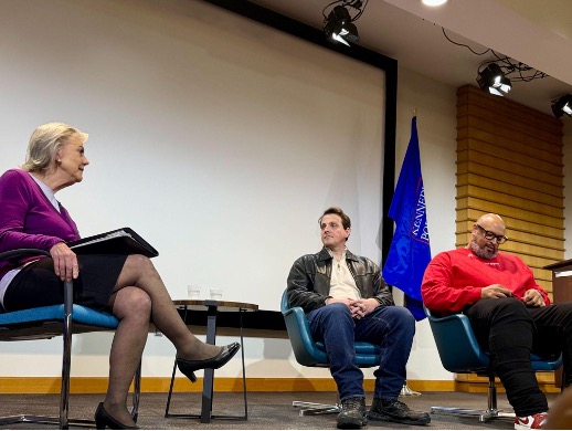 Police officers speaking to American University students