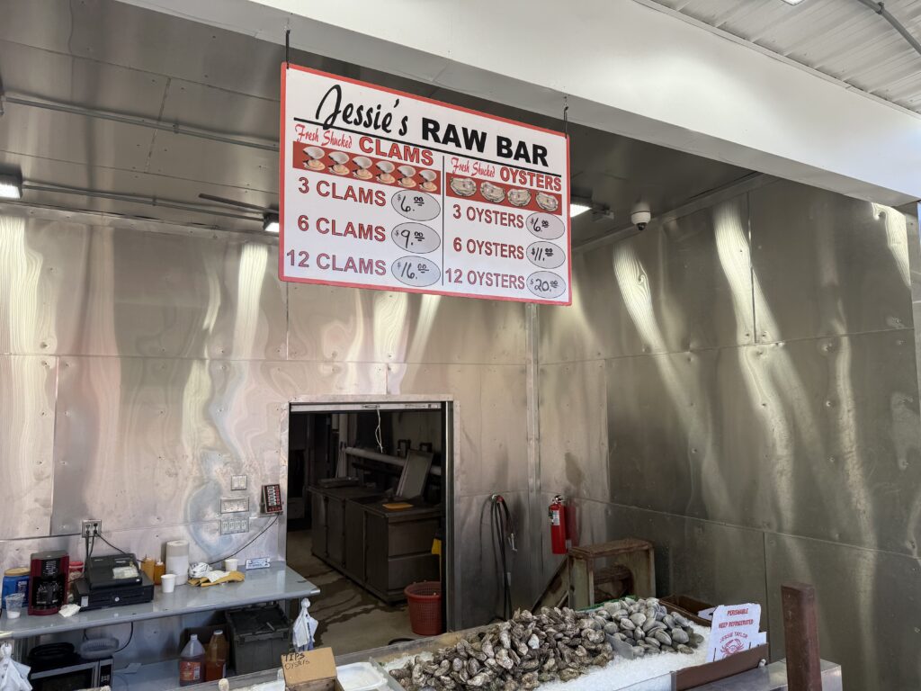 A raw bar sign at Jessie Taylor Seafood at The Wharf (Kordell Martin)