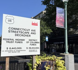 A project sign details the $37 million budget for the Connecticut Avenue Streetscape and Deckover, funded by both the federal government and the District.( Yi Ya (Becky) Tseng)