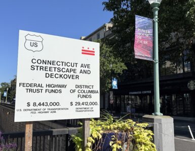 A project sign details the $37 million budget for the Connecticut Avenue Streetscape and Deckover, funded by both the federal government and the District.( Yi Ya (Becky) Tseng)