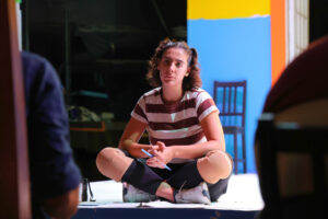 Actress Camila Cossa listens to director Mauricio Pita during a rehearsal for Héctor, El Niño Eléctrico at GALA Hispanic Theatre. (Kelly Doyle)
