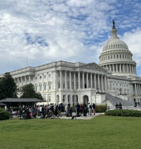 People stand outside the Capital Building on Wednesday, Oct. 15, 2025. (Isabel Del Mastro)