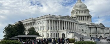 People stand outside the Capital Building on Wednesday, Oct. 15, 2025. (Isabel Del Mastro)