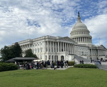 People stand outside the Capital Building on Wednesday, Oct. 15, 2025. (Isabel Del Mastro)