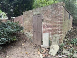 The brick burial vault serving was a shelter for runaway slaves. (Joshua Sun)
