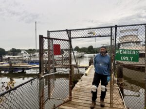 Seafarers Yacht Club business manager working on upgrading the dock. (Ellen Tannor)