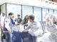 Members of the SVA host a fundraiser in front of the Blackburn Center while trying to convince Dr. Paris Adon, left, to join.
