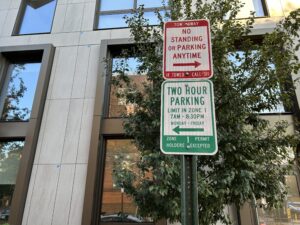 Parking signs on Mozart Place in Adams Morgan. (Isabel Del Mastro).