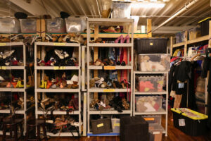 Costumes and props are stocked on shelves from 50 years of GALA productions. (Kelly Doyle)