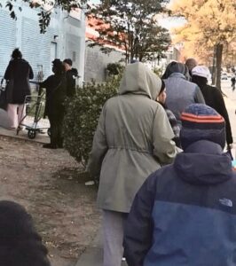 People standing in line for food assistance at a D.C. community center (Lynn Howard)