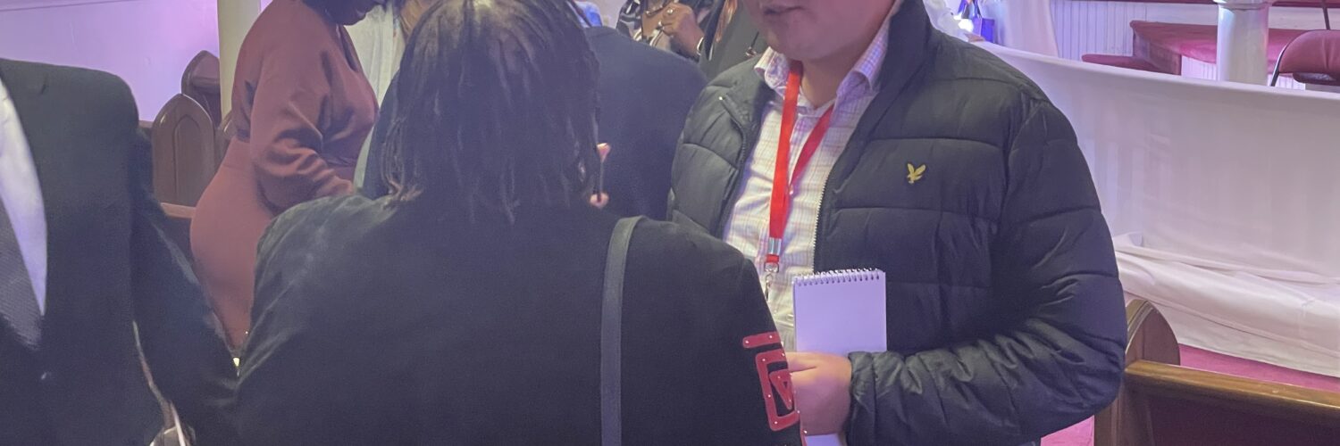 AU grad student George Smith interviewing church goers in Virginia before the 2025 election.