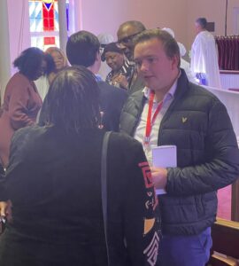 AU grad student George Smith interviewing church goers in Virginia before the 2025 election.