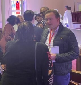 AU grad student George Smith interviewing church goers in Virginia before the 2025 election.