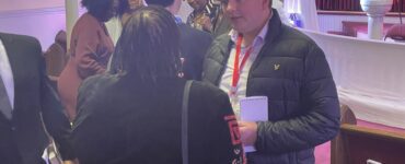 AU grad student George Smith interviewing church goers in Virginia before the 2025 election.