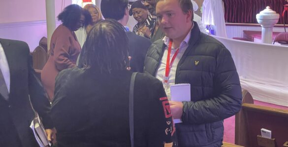 AU grad student George Smith interviewing church goers in Virginia before the 2025 election.