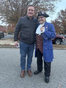 AU graduate student Smith and "Patrick Henry" at a campaign event. (Gary LaBella)