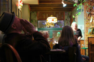 Kevin Lambert, founder and emcee of Open Piano, cheers in the audience. (Kelly Doyle)