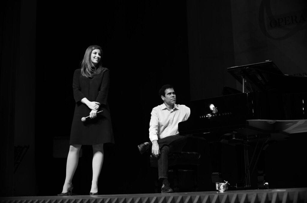 Julia Lagahuzère (left) and Kamal Khan [co-founder and artistic and musical director] listening to Fleming give feedback during masterclass (right) (photo: Antoine Sanfuentes)