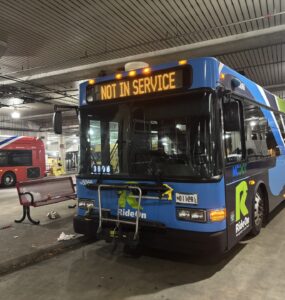 A Montgomery County Ride On bus sits at the bus station near Bethesda Metro Station Nov. 6, 2025. (Kendall Staton) 