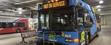 A Montgomery County Ride On bus sits at the bus station near Bethesda Metro Station Nov. 6, 2025. (Kendall Staton)