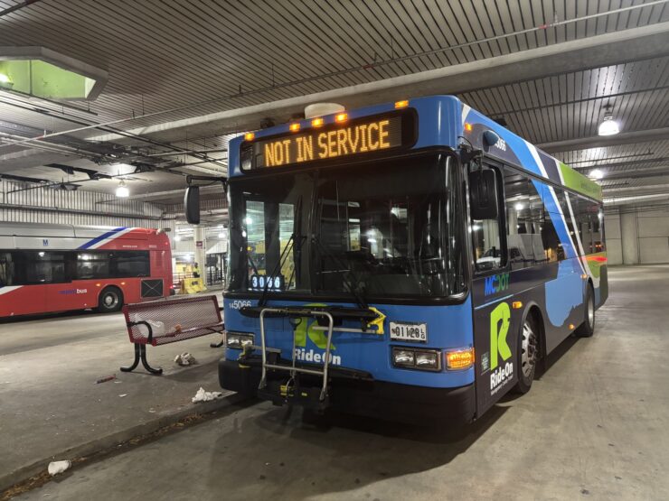 A Montgomery County Ride On bus sits at the bus station near Bethesda Metro Station Nov. 6, 2025. (Kendall Staton) 